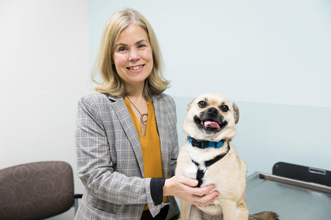 College of Veterinary Medicine Interim Dean Laura Molgaard and friend.